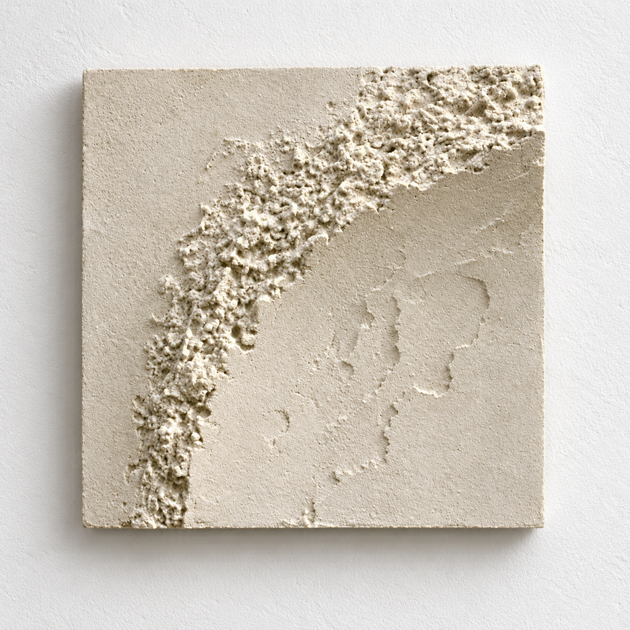 Close front view of the rough white arc on the Moonshell Lava Corner Curve panel.