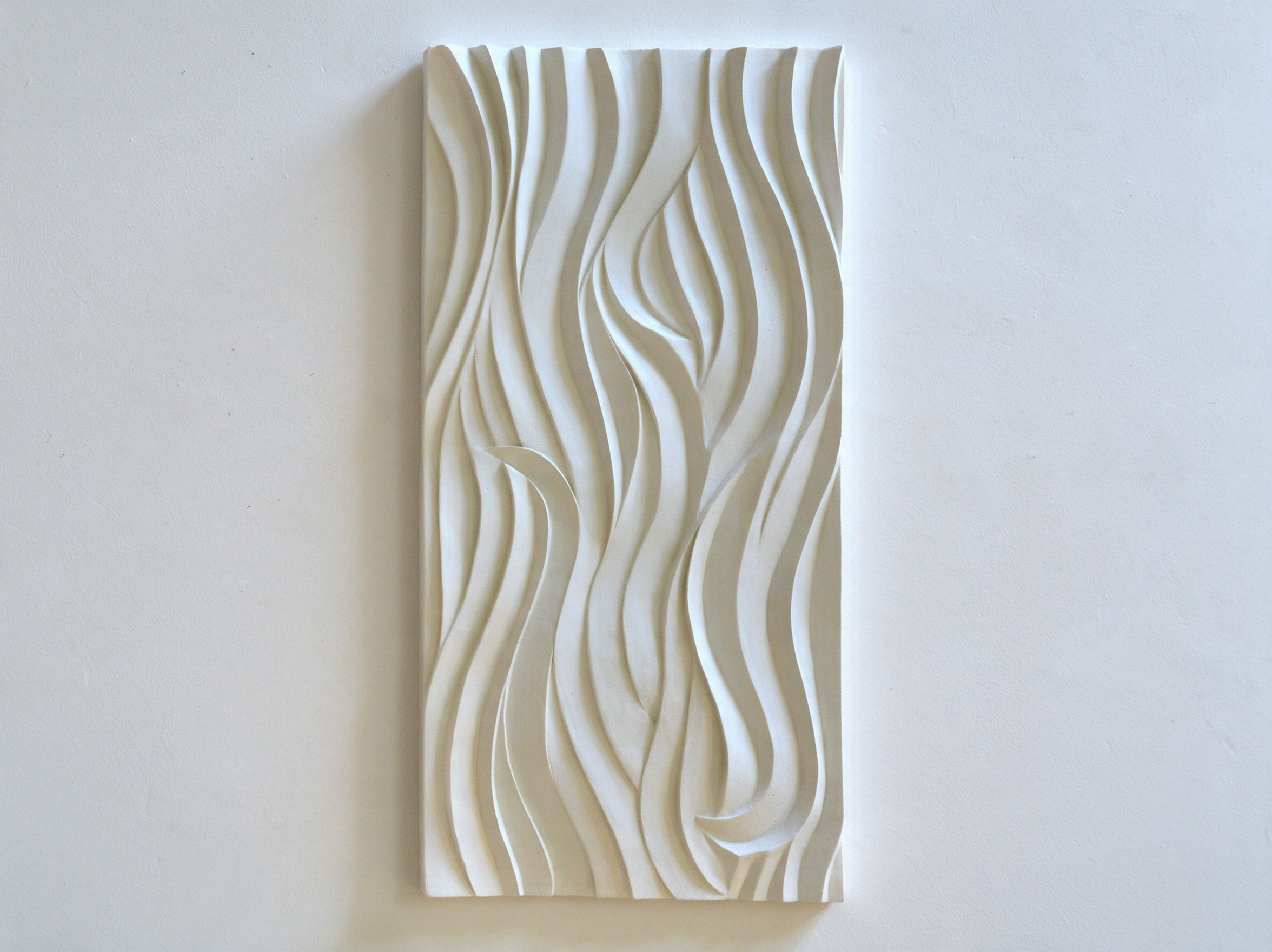 White Seaweed Ripple Smooth panel arranged vertically against a pale background.