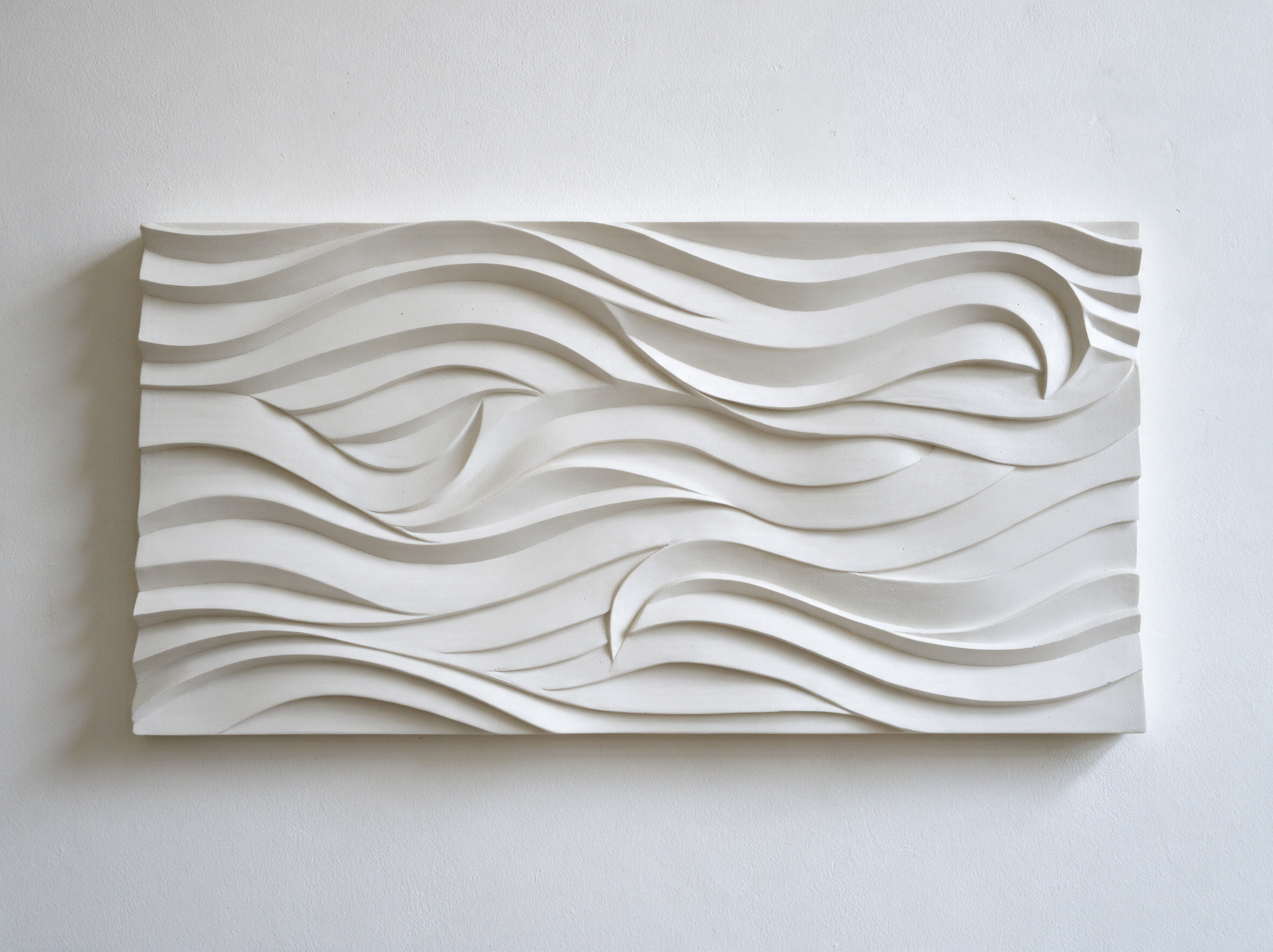 White Seaweed Ripple Smooth horizontal panel with layered flowing wave ridges.
