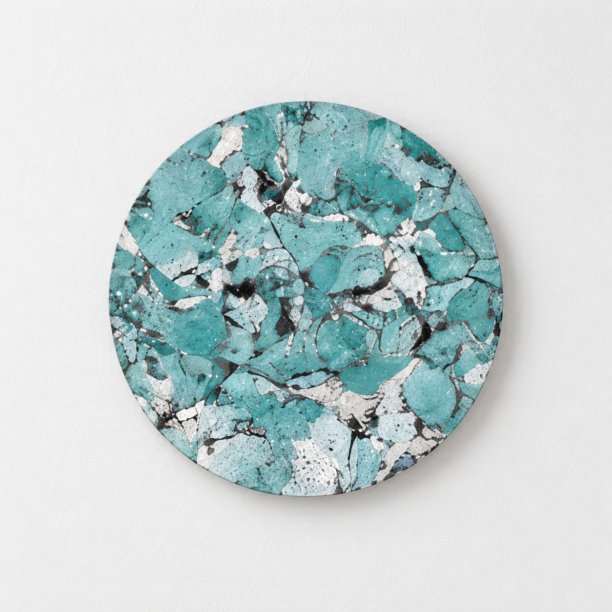 Pale blue and white marbled circular wall panel against a white background.