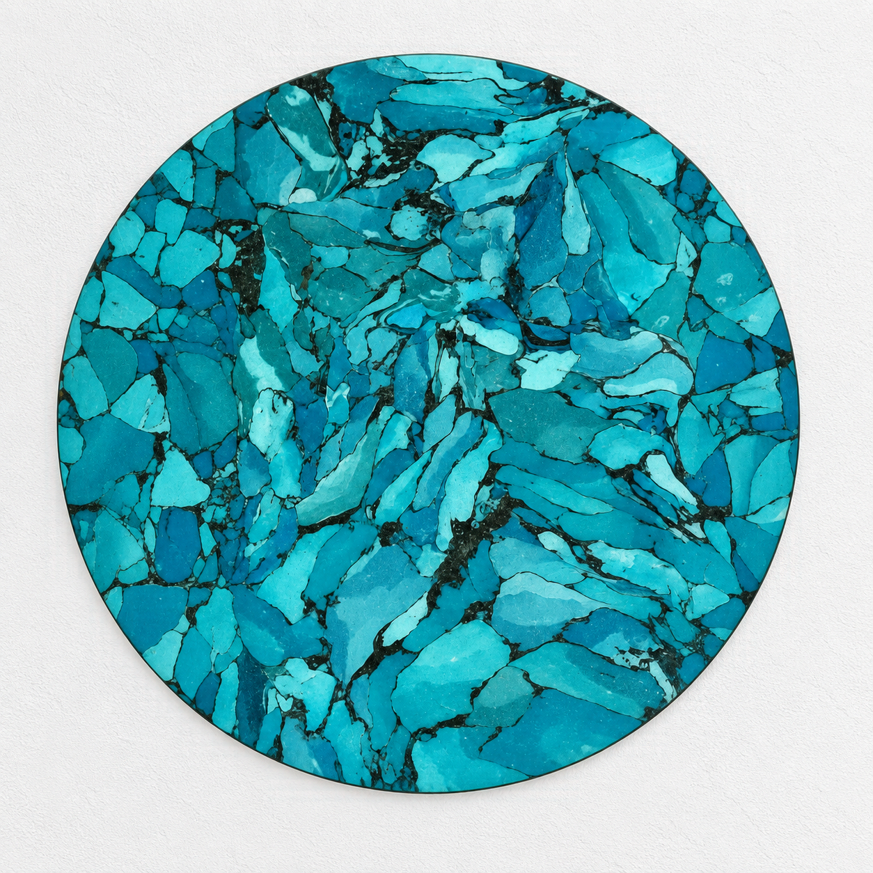 Turquoise marbled circular wall panel with dark veining against a white background.
