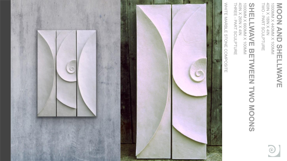 Two abstract sculptures in white marble stone depicting shells between two moons, arranged vertically on a wall.