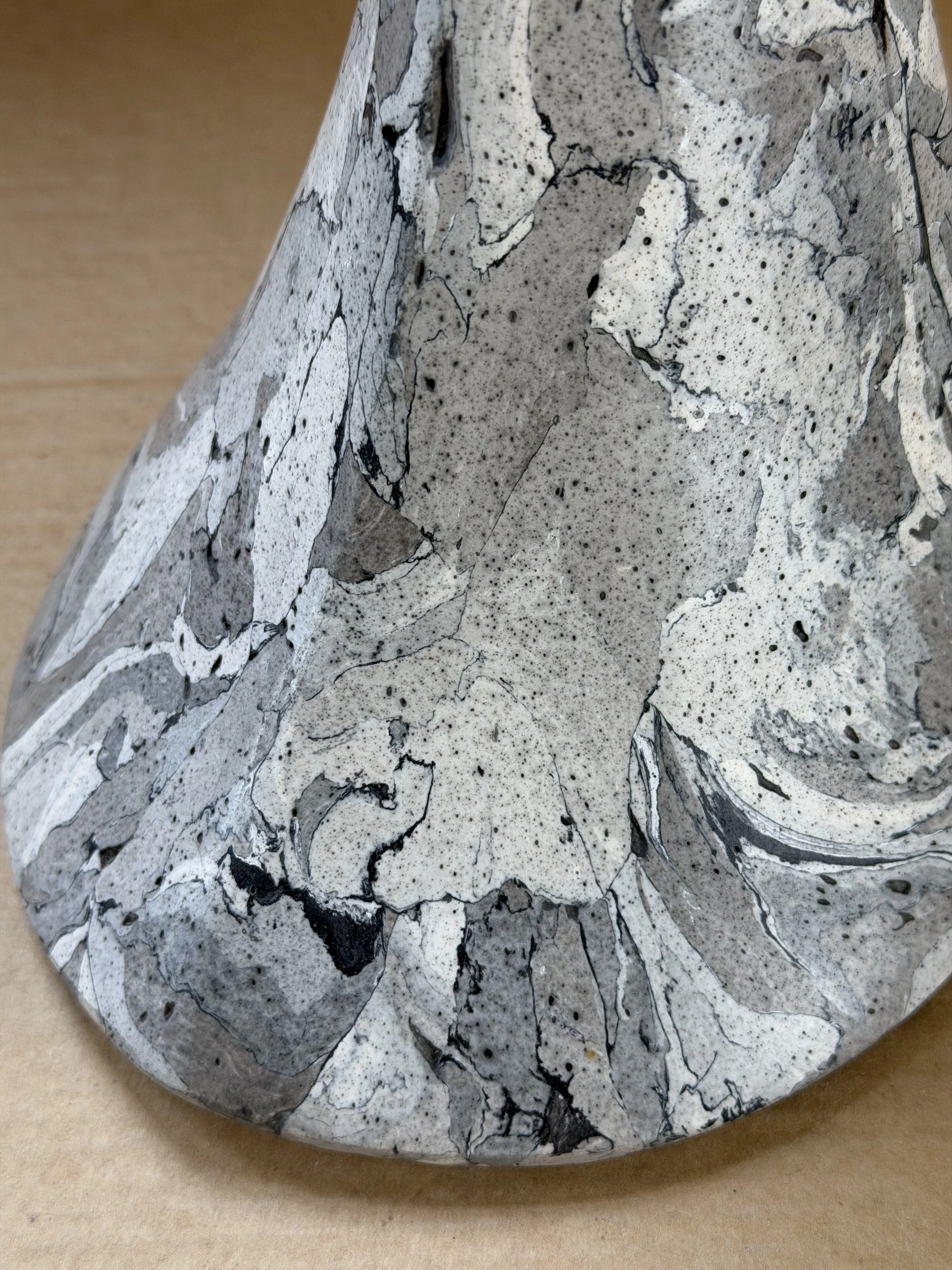 Detail of the shoulder of the Gray Marble Table Lamp base where the cone narrows