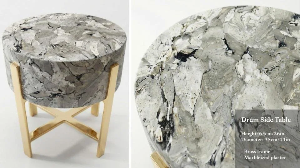 Marble side table with a brass frame, 65 cm tall, 35 cm diameter, featuring a rounded marble top with gray, black, and white veining, shown from two angles.