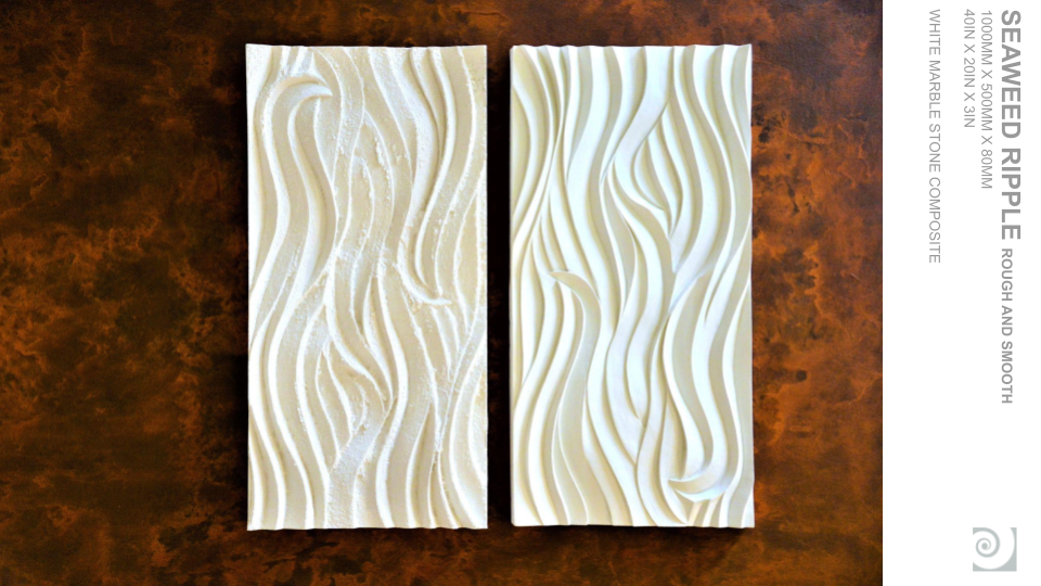 Two ceramic tiles with white, wavy, textured patterns, placed side by side on a brown surface.