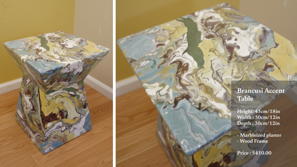 Marbled accent table with a wood frame, featuring a marbled plaster surface in shades of yellow, blue, white, and brown. The table is shown from two angles, next to a yellow wall and wooden floor.