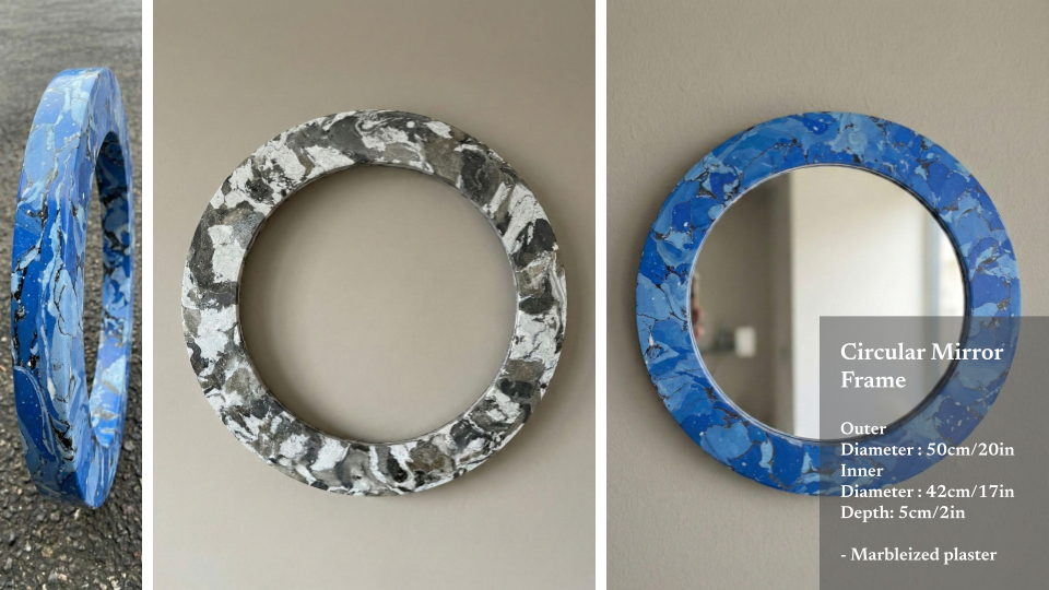 Three decorative round mirror frames, each with colorful marbleized plaster finish, including a blue, black and white pattern, and a black, white, and gray pattern.