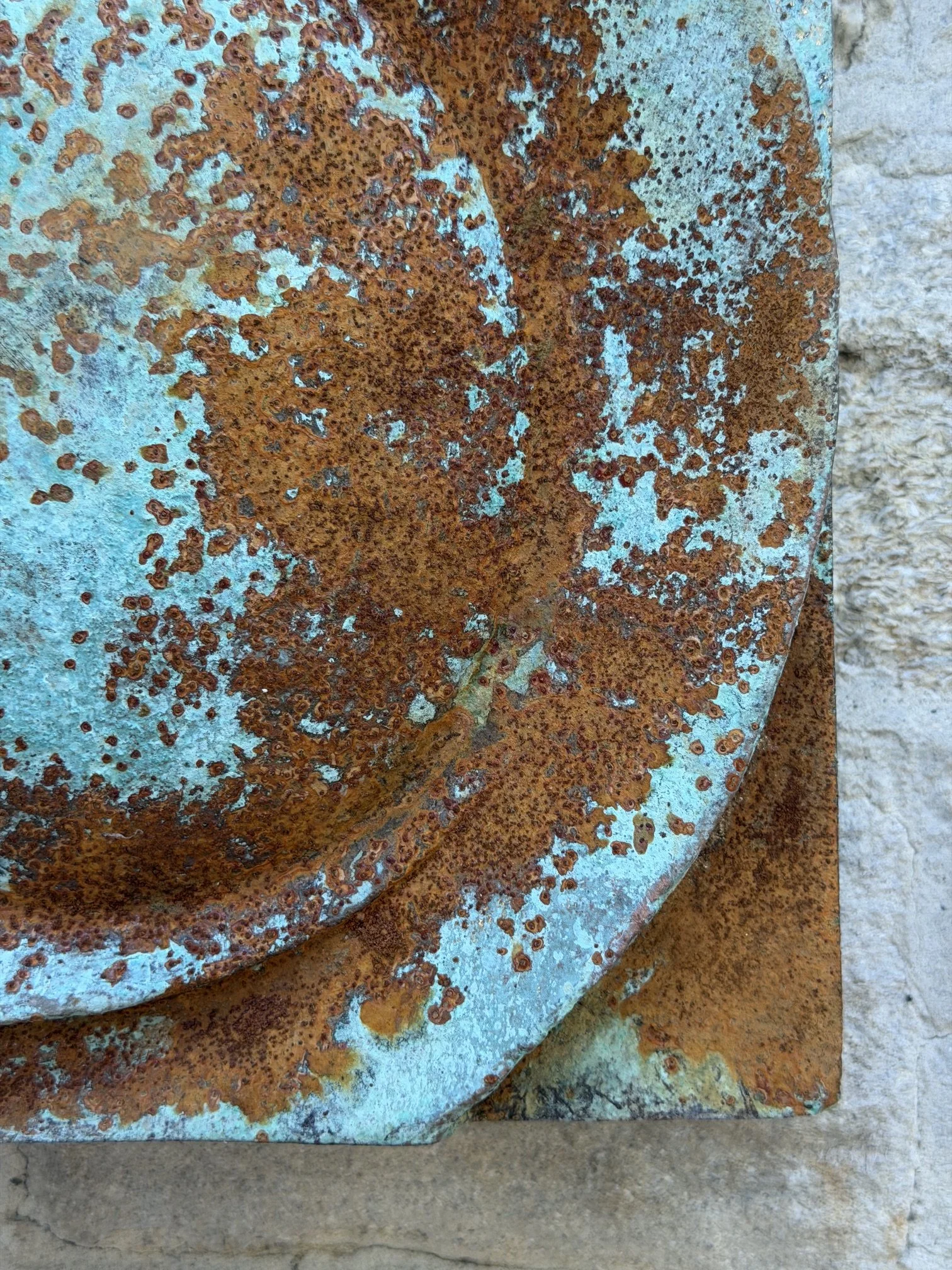Moon Crater Phase Blue Wall Sculpture seen from below, the crater disc set into its square panel