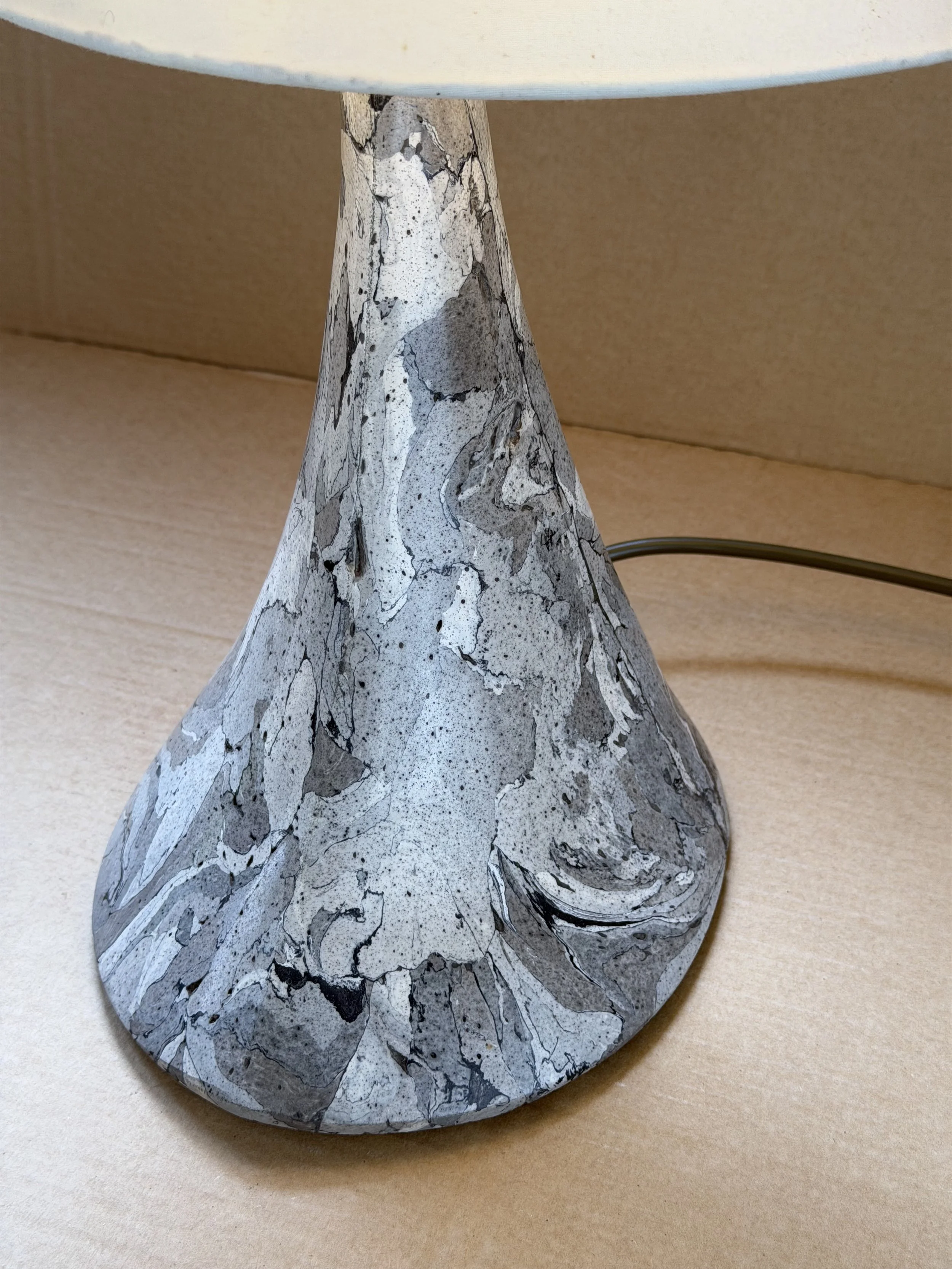 Gray Marble Table Lamp with its shade in place, seen from slightly to one side