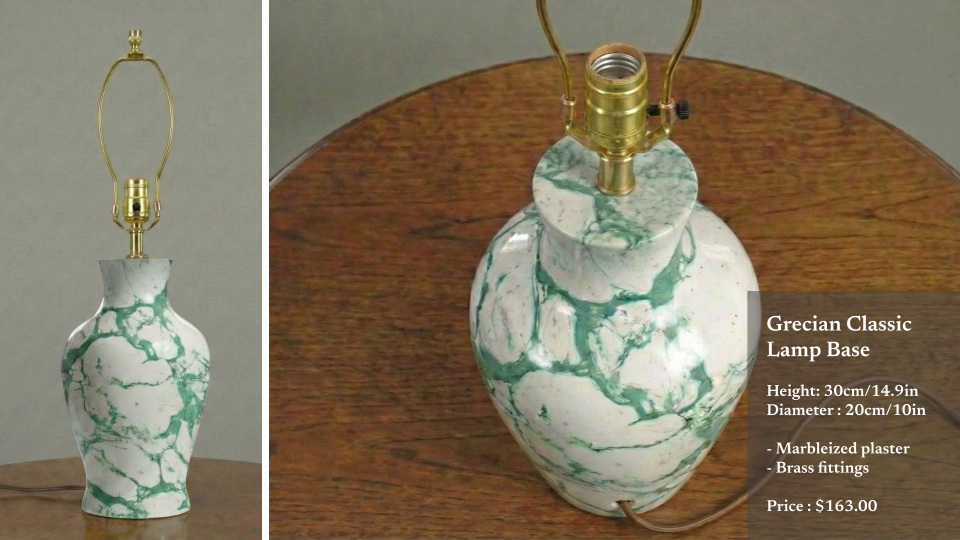 Marbleized Grecian classic lamp base with brass fittings on a wooden surface.