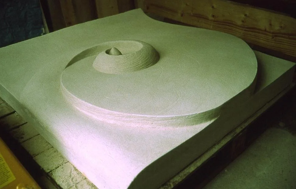 Raking light across the Barbados Wave relief, showing the depth of the carved spiral