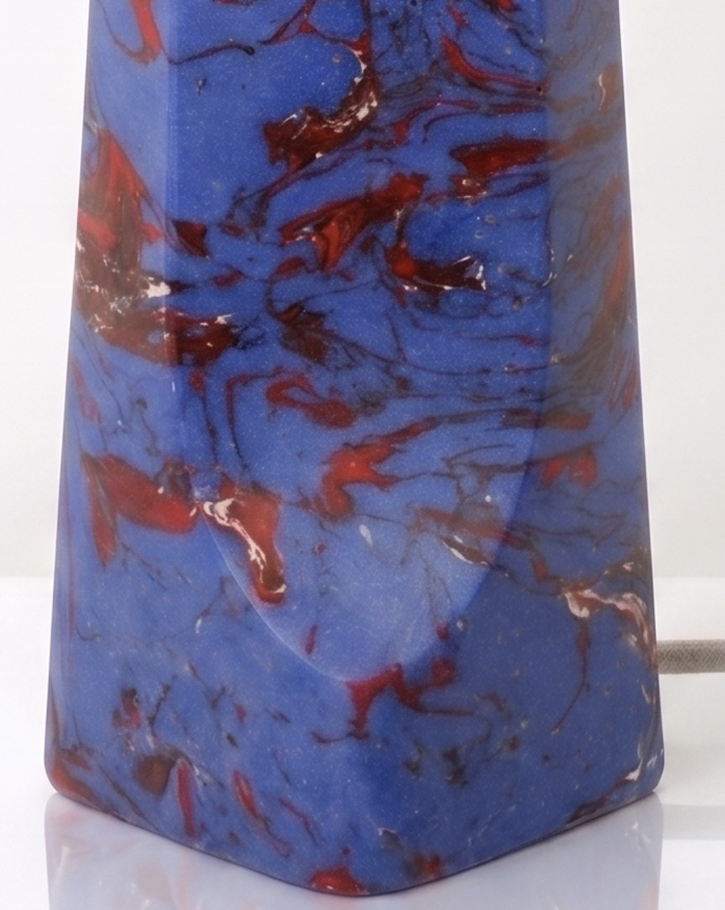 Detail of the Blue and Red Swirl Lamp Base showing the polished marbled finish on the tapered column