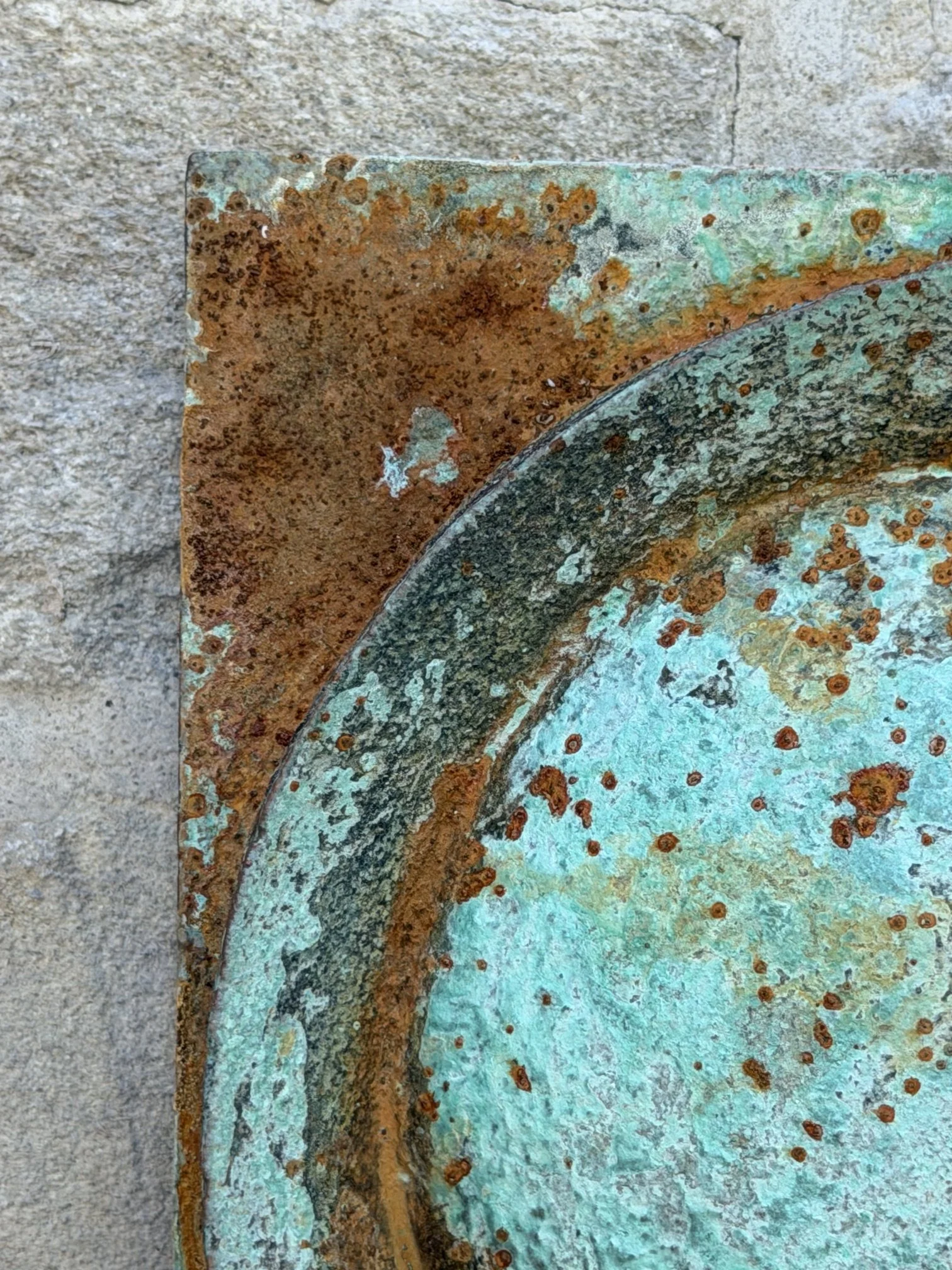 Moon Crater Verdigris Rust Wall Sculpture, the crater disc mottled in green verdigris and orange rust