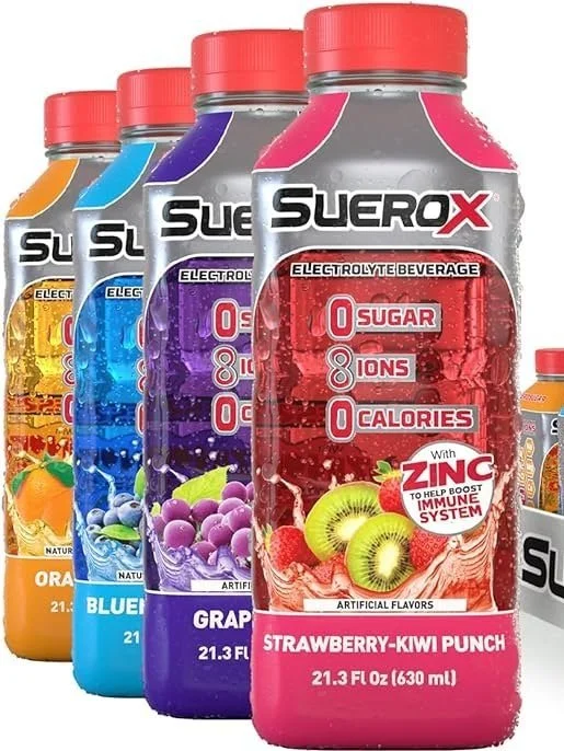 Four SueroX hydration drinks arranged from front to back in pink, purple, blue, and orange flavors.