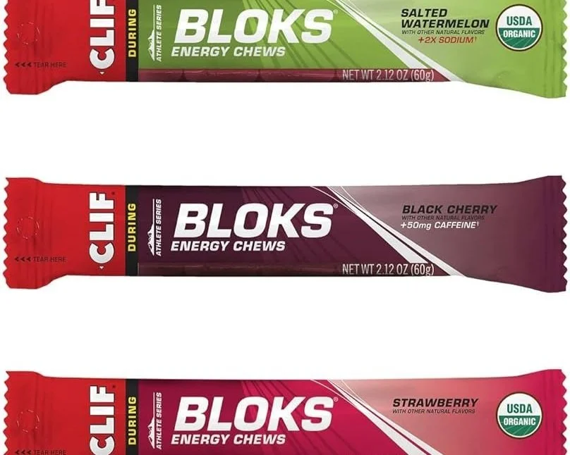 Three CLIF BLOKS products in green, purple, and pink from top to bottom.