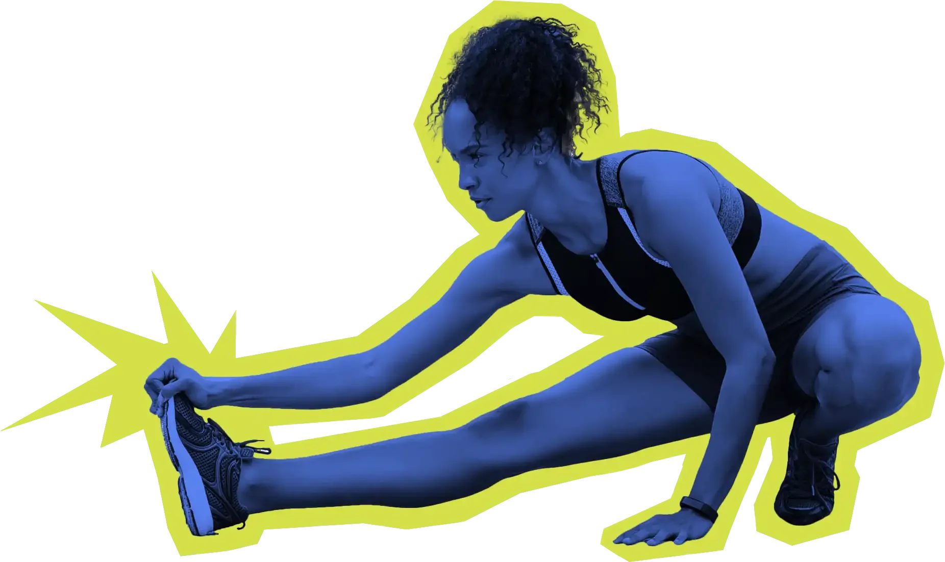 Female athlete in athletic clothing stretching on the floor and reaching for her foot.