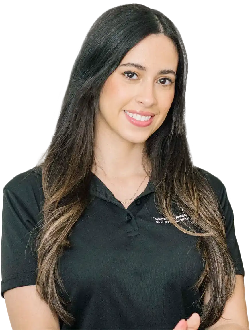 A female sports nutritionist and dietitian, Tatiana Velez, with long dark brown hair, smiling, wearing a black collared shirt.