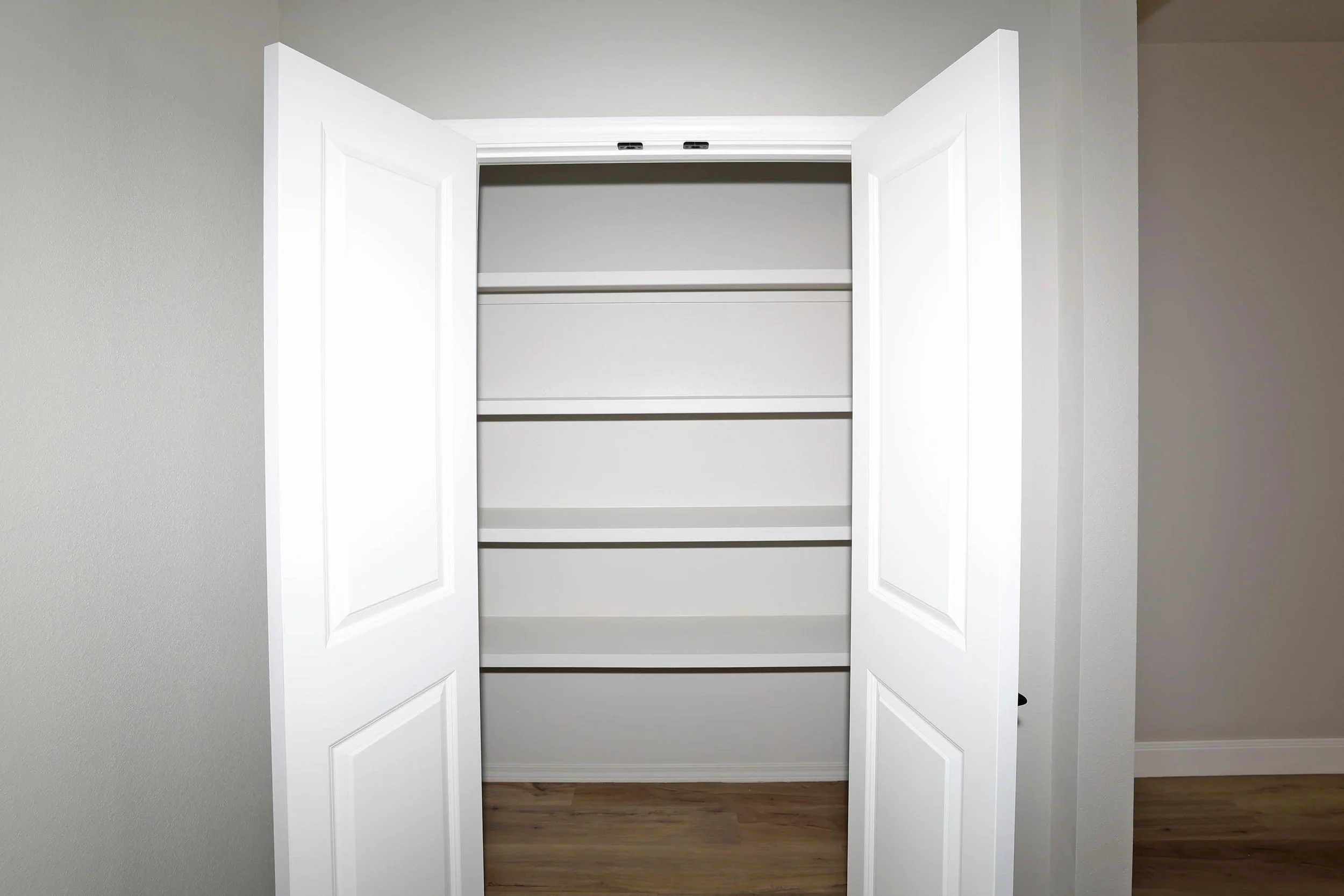 18-Primary Bedroom Entry Storage Closet.jpg