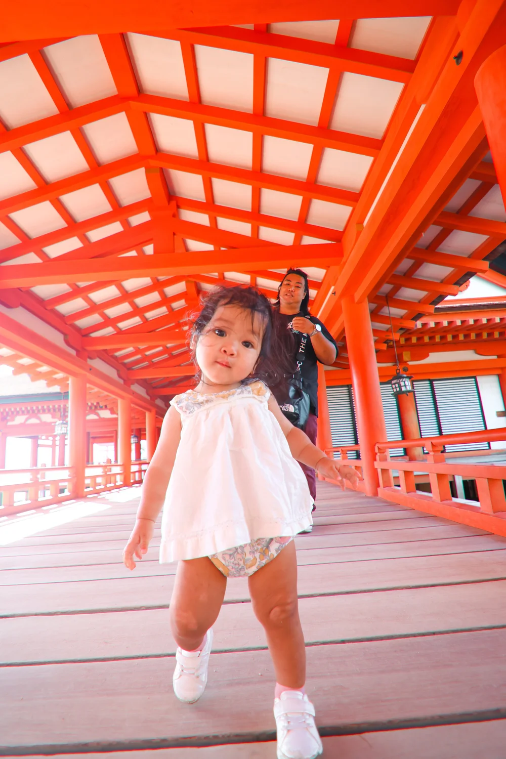 ItsukushimaShrine.ToddlerWalkingTowardsCamera.JPG