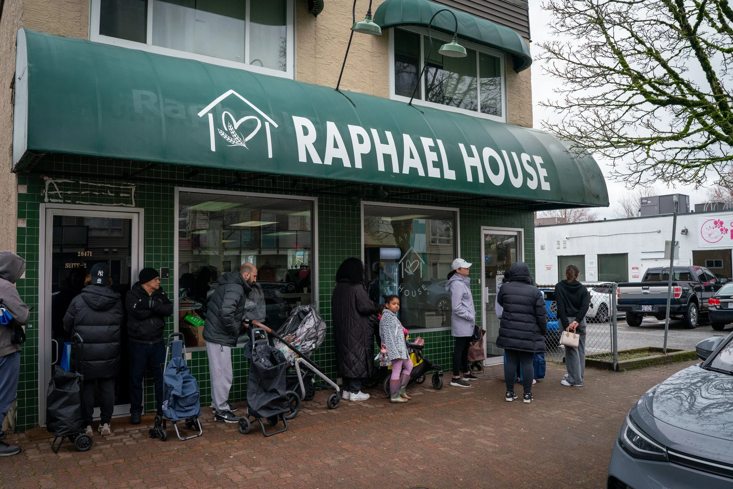 Weekly grocery distribution at Raphael House food hub in Langley BC