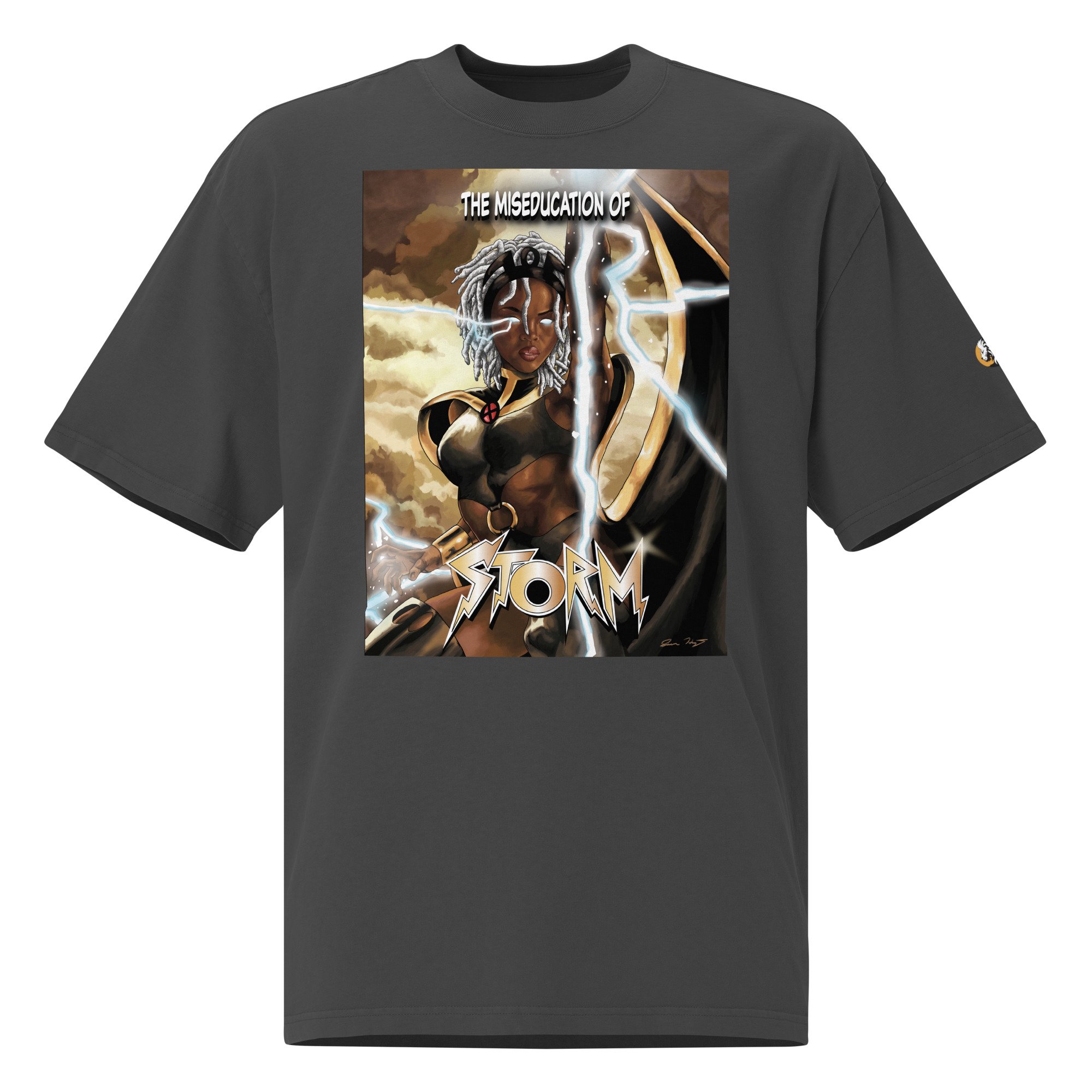 Oversized faded black T-shirt featuring 'The Miseducation of Storm' graphic, depicting Storm with lightning and bold typography.