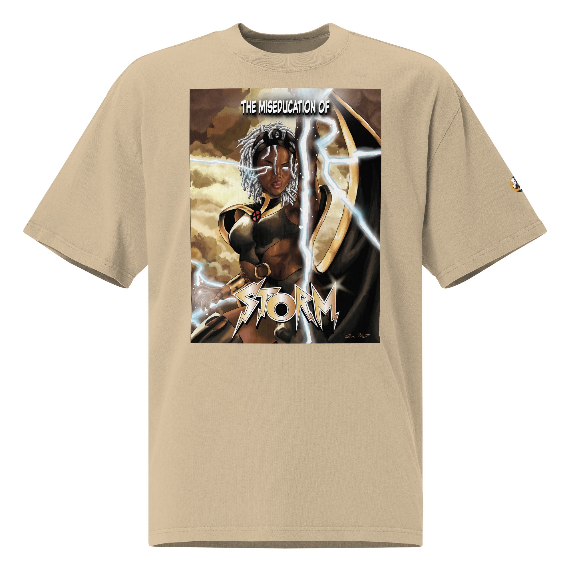 Oversized faded beige T-shirt featuring 'The Miseducation of Storm' graphic, depicting Storm with lightning and bold typography.