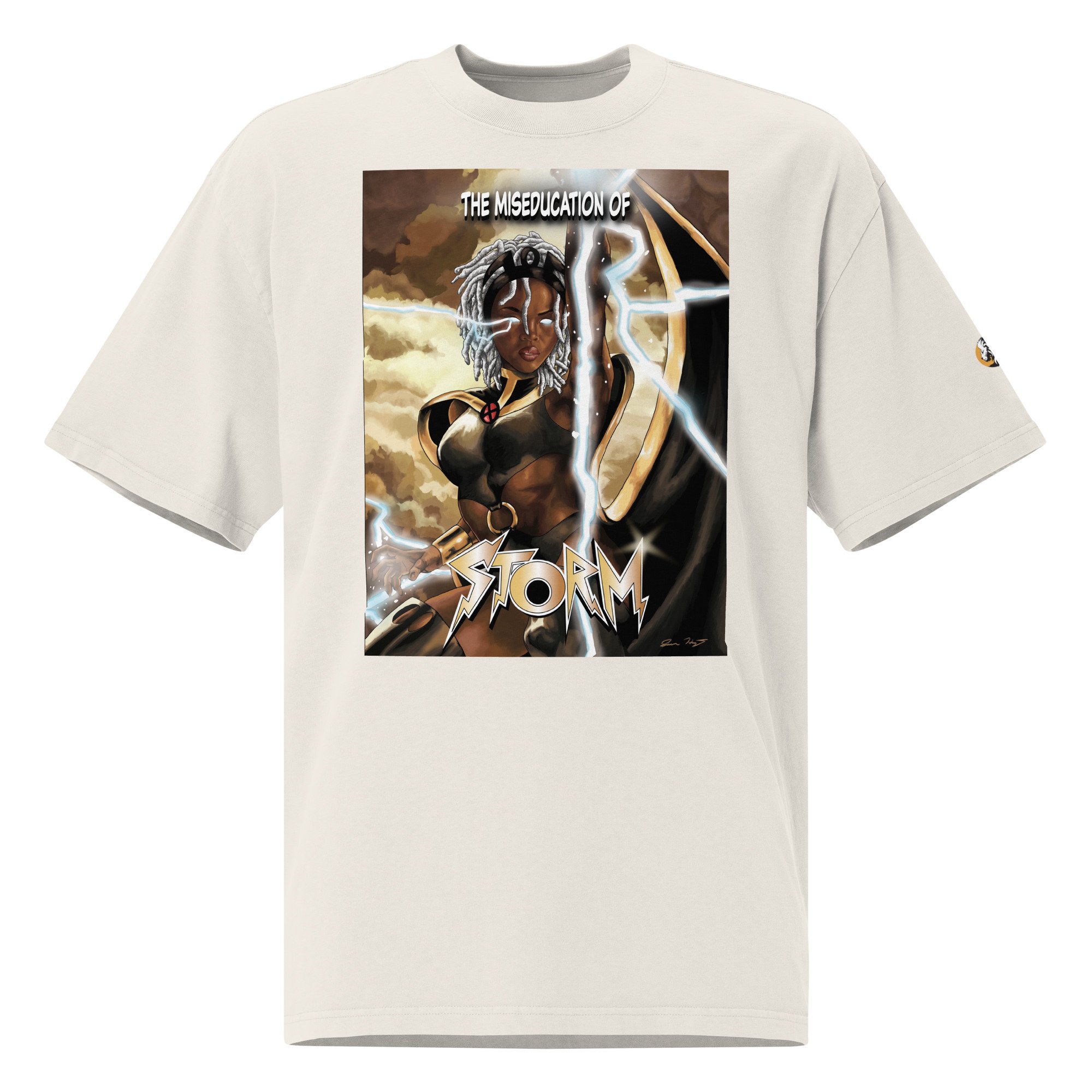 Oversized faded bone colored T-shirt featuring 'The Miseducation of Storm' graphic, depicting Storm with lightning and bold typography.
