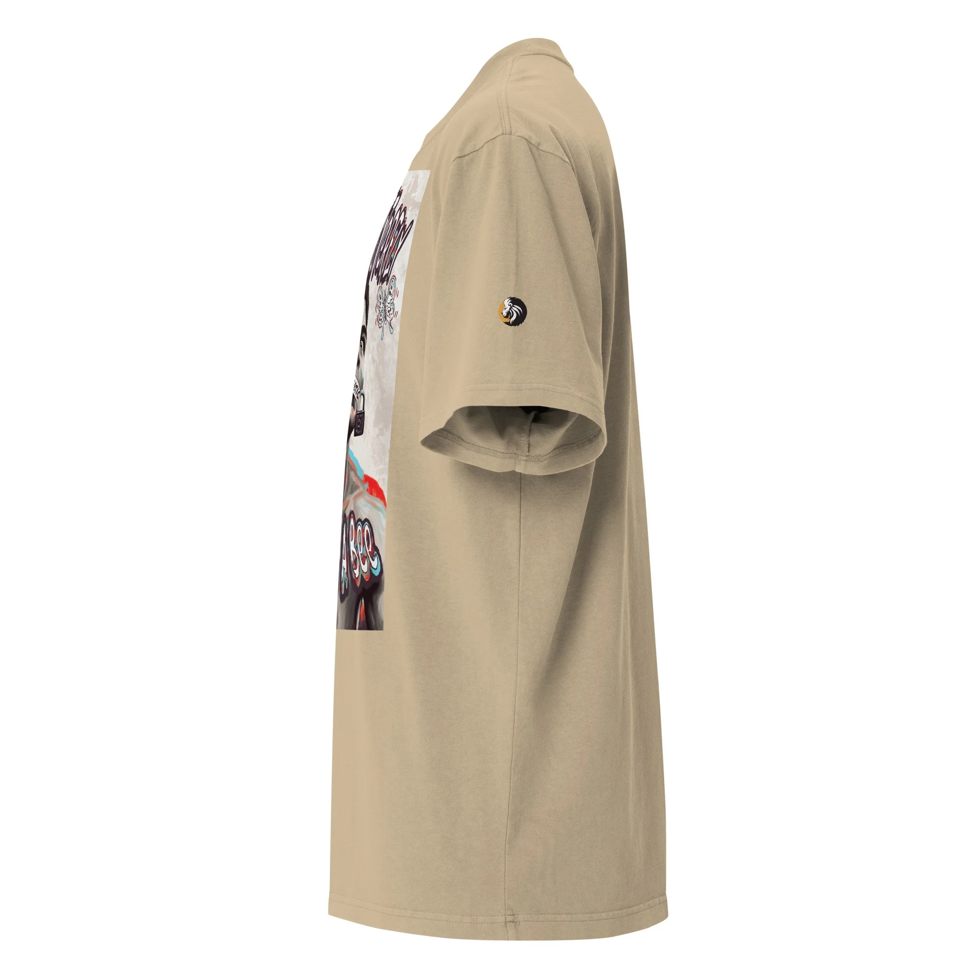 Side view of a beige oversized T-shirt featuring a Muhammad Ali graphic with 'Float like a butterfly, sting like a bee' and a small embroidered sleeve logo