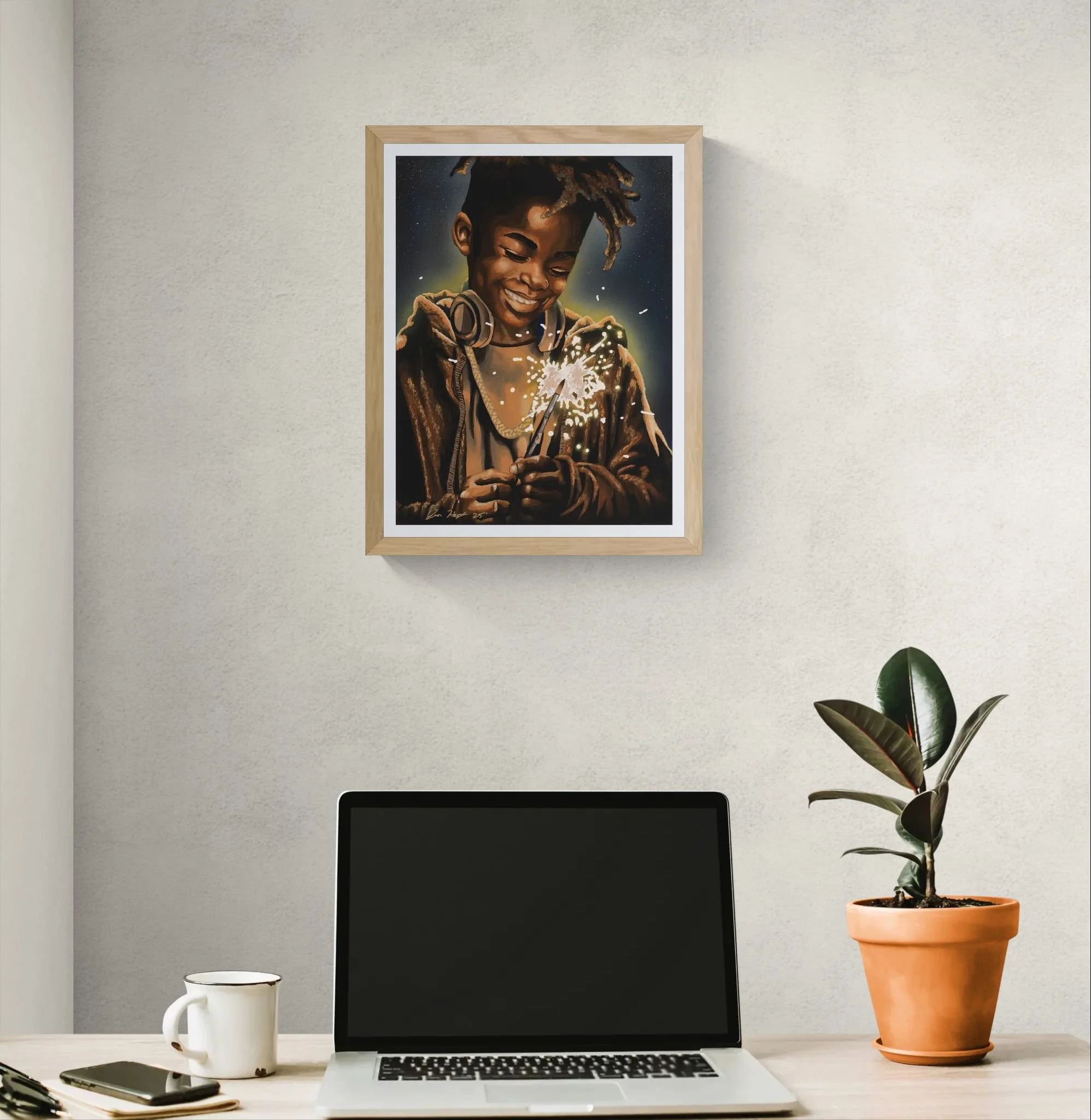 Home office with a laptop and potted plant.jpeg