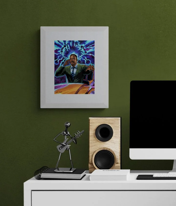 Framed Comic Book inspired Martin Luther King Jr. artwork displayed above a modern home office desk with a sleek design