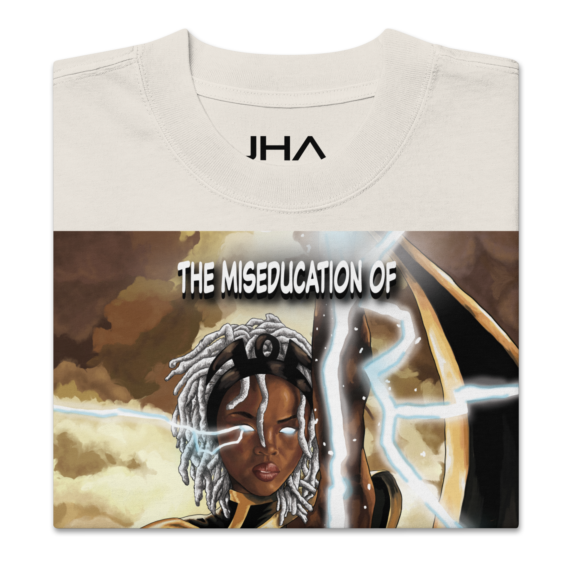 Folded oversized faded bone T-shirt featuring 'The Miseducation of Storm' graphic, showcasing Storm with glowing eyes and lightning details.