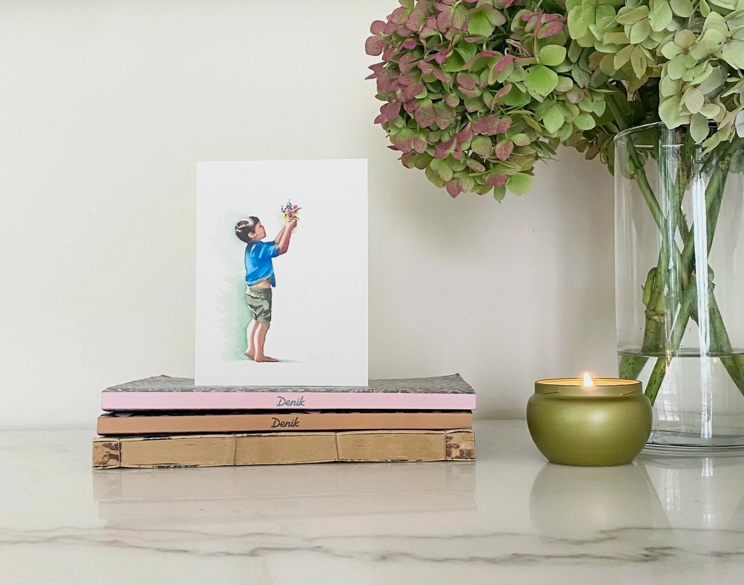 watercolor print greeting card of little boy holding up flowers