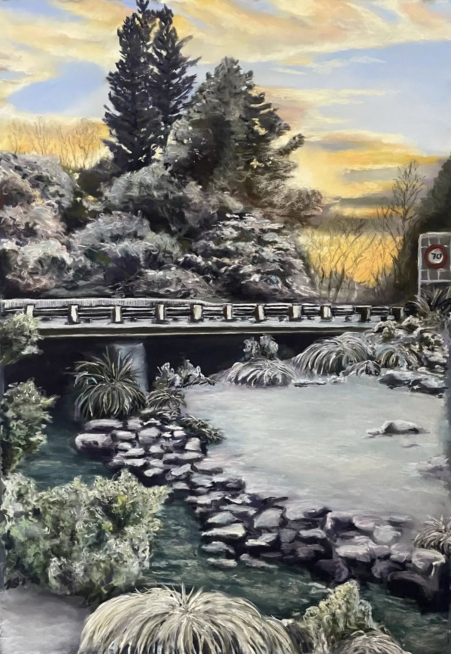 Impressionist winter landscape painting of a rocky stream beneath a bridge, snow-covered evergreen trees, ornamental grasses, and a 70 speed-limit sign at sunset.