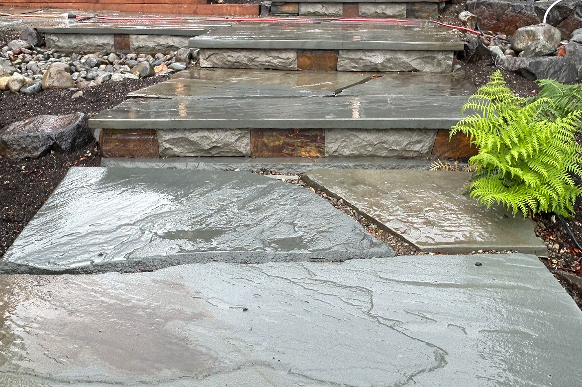 Stone steps and bluestone path in Gig Harbor crafted by 7 Lamps Construction (Gig Harbor). www.7lamps.com