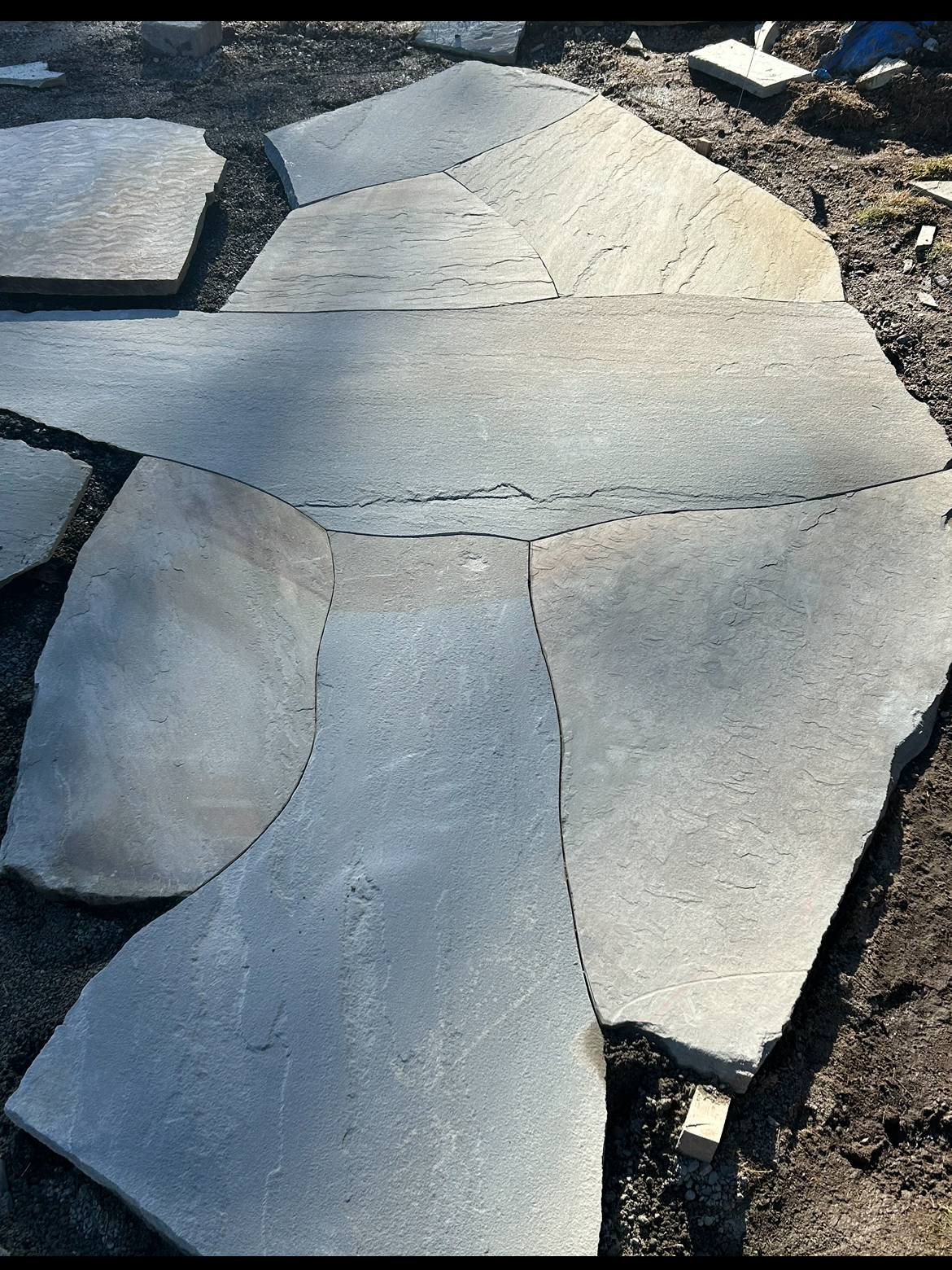 Stone patio in Gig Harbor area crafted by 7 Lamps Construction (Gig Harbor). www.7lamps.com