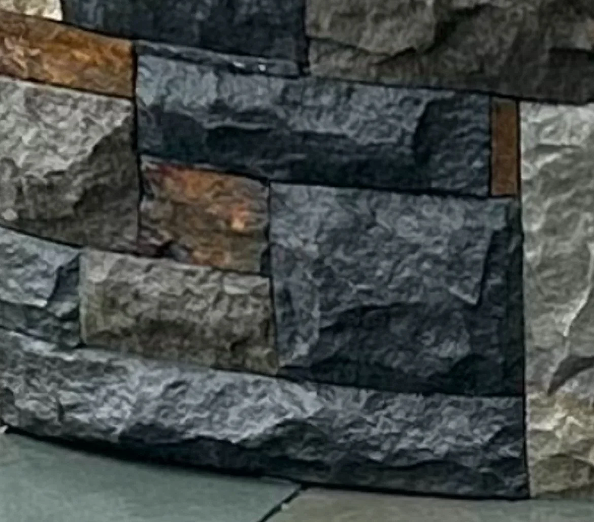 Close-up of a stone wall in Gig Harbor crafted by 7 Lamps Construction (Gig Harbor). www.7lamps.com
