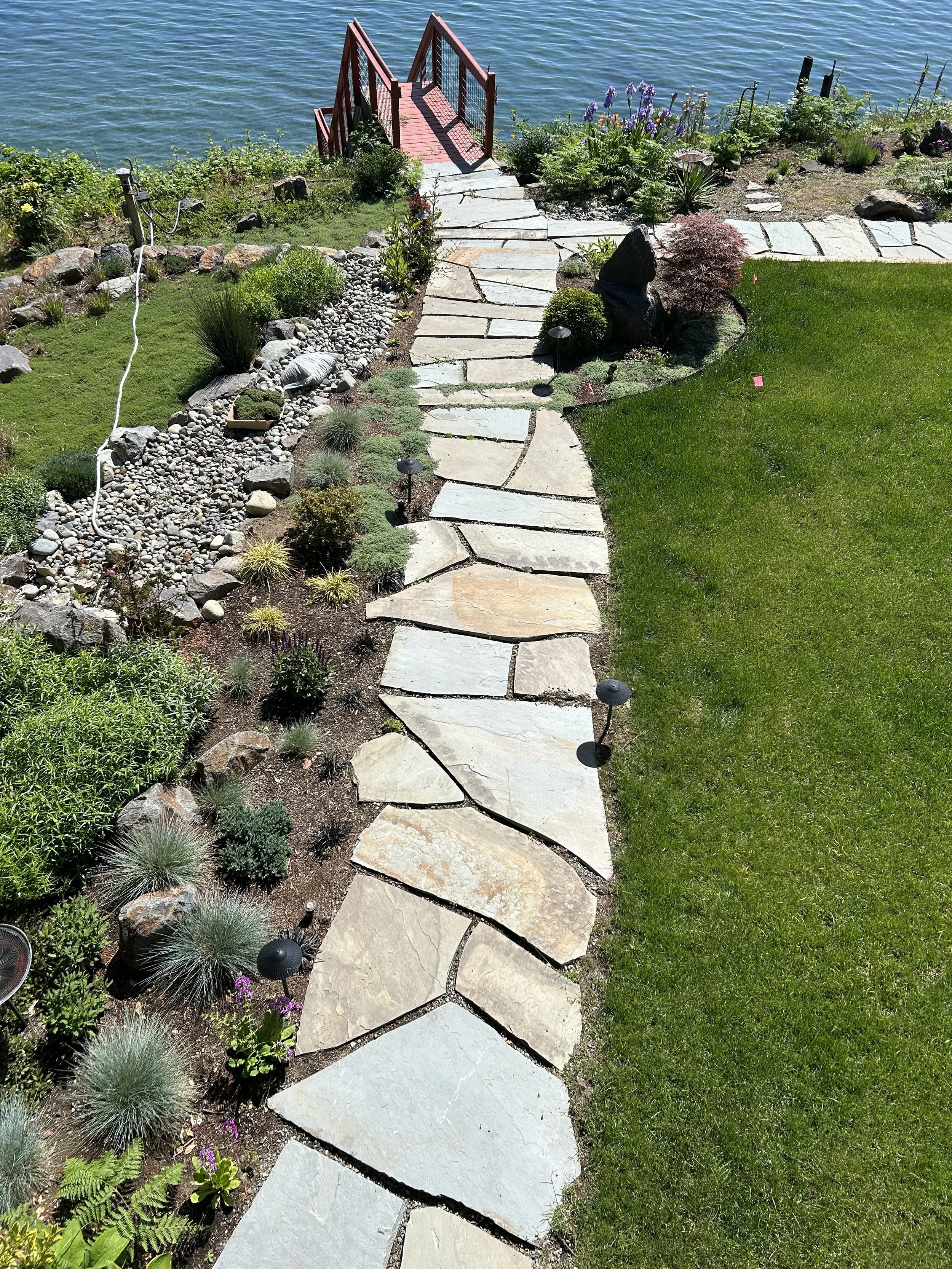 Stone pathway with stone steps in Gig Harbor area crafted by 7 Lamps Construction (Gig Harbor). www.7lamps.com