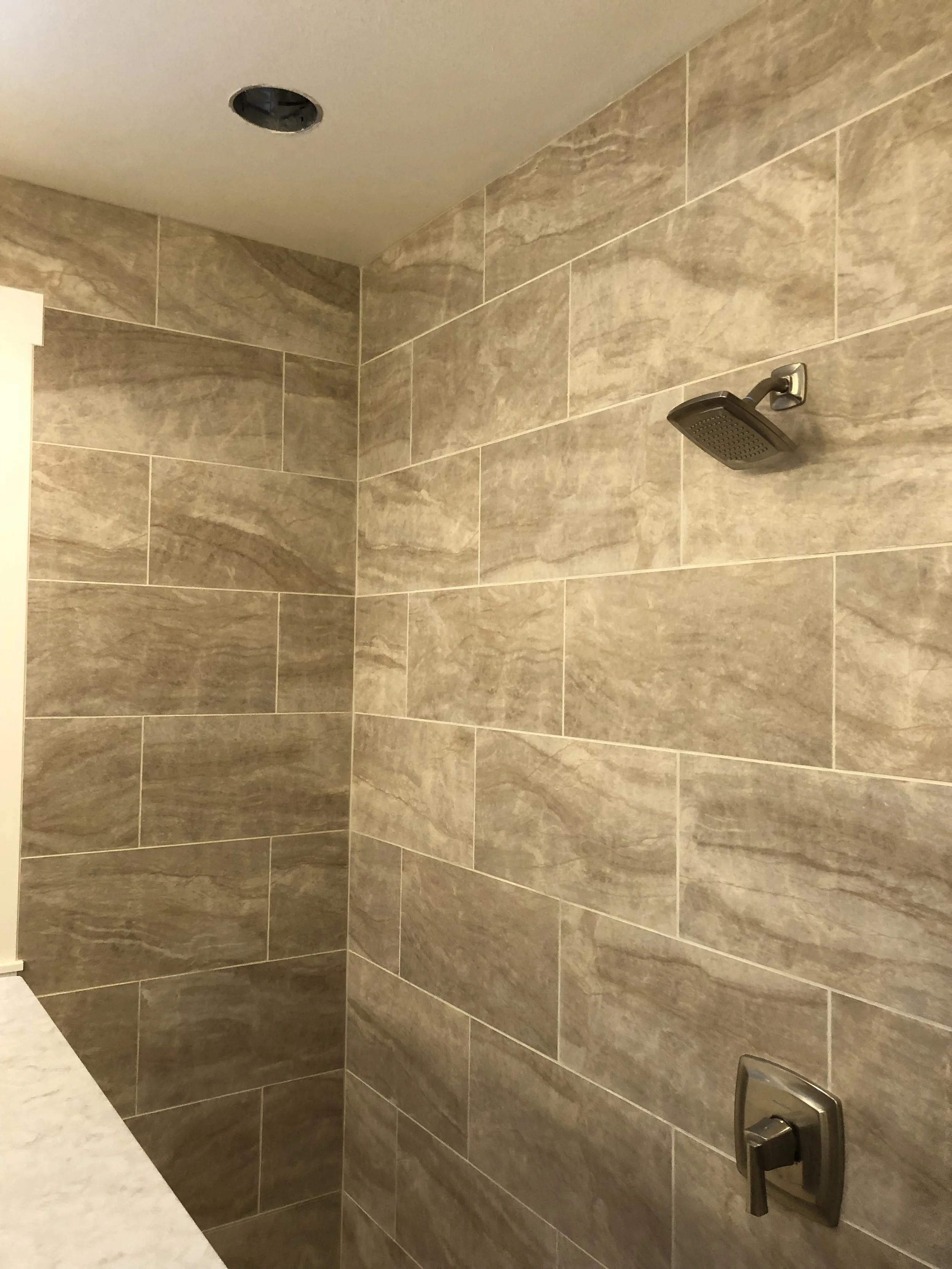 Tile shower, tile bathroom in Tacoma in University Place crafted by 7 Lamps Construction (Gig Harbor). www.7lamps.com