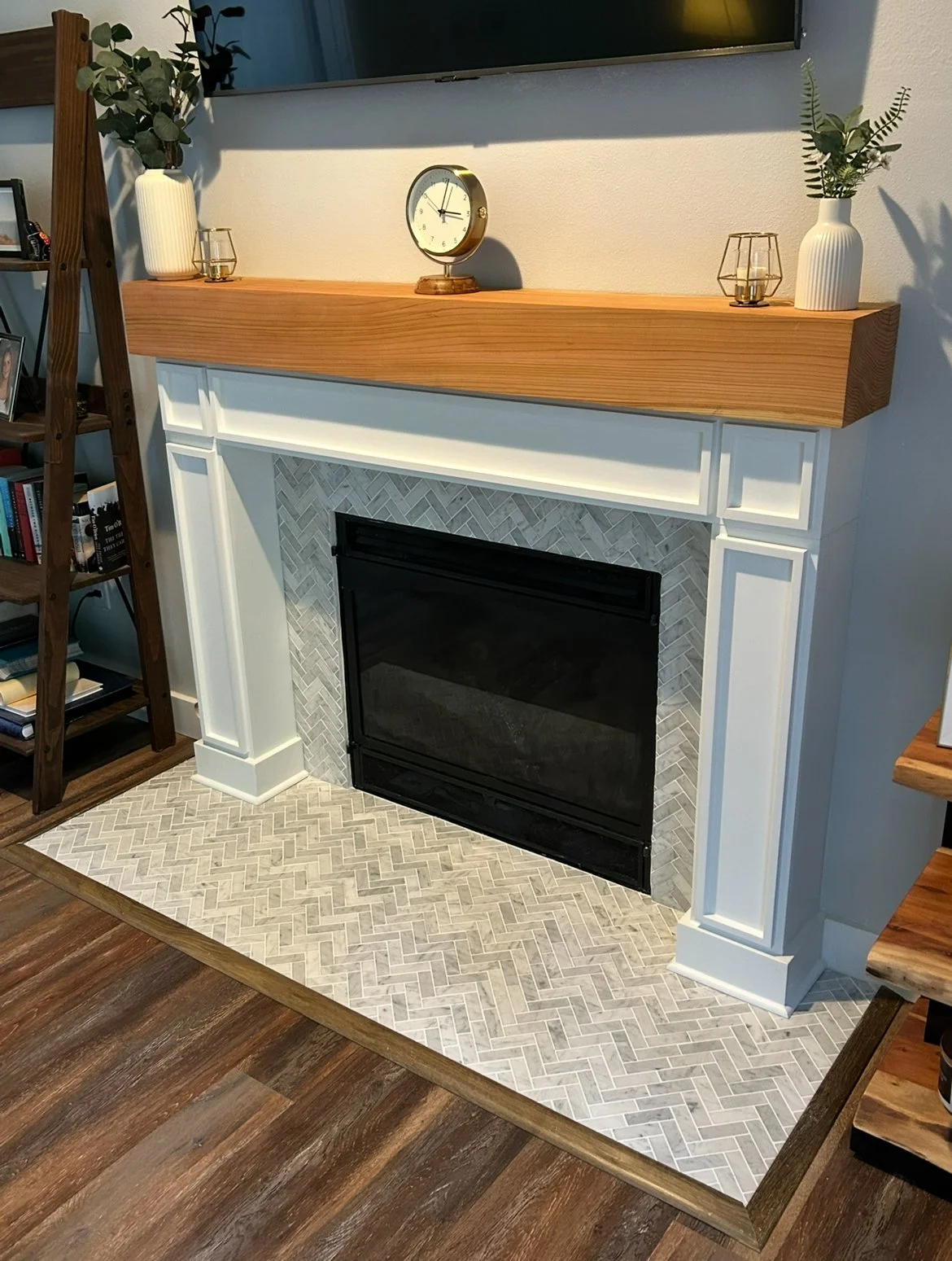 Fireplace remodel with custom wood mantle in Gig Harbor crafted by 7 Lamps Construction (Gig Harbor). www.7lamps.com