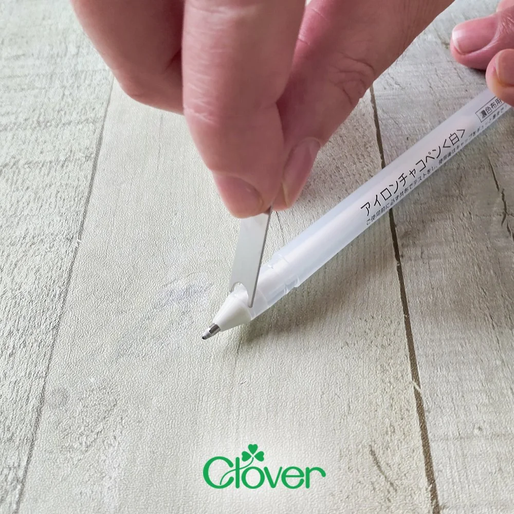 Clover White Marking Pen (Fine) Disappears when ironed or washed. The White Marking Pen is ideal for marking dark-coloured cotton fabrics.  The ink is formulated to disappear when ironed or washed.