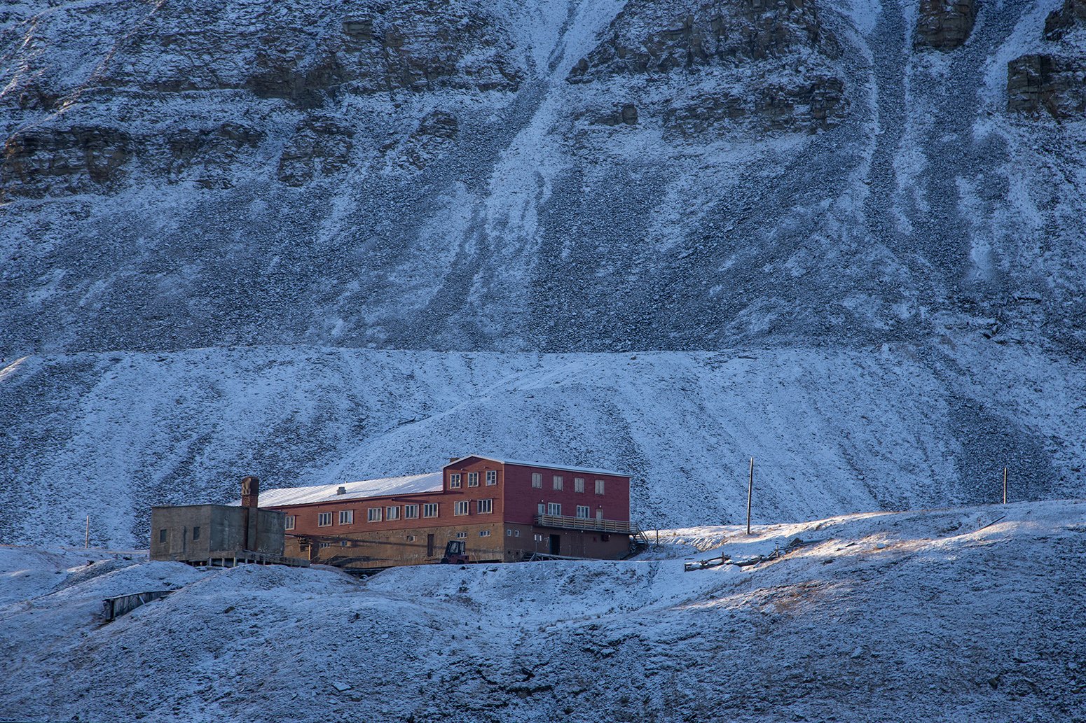 Red building, blue snow