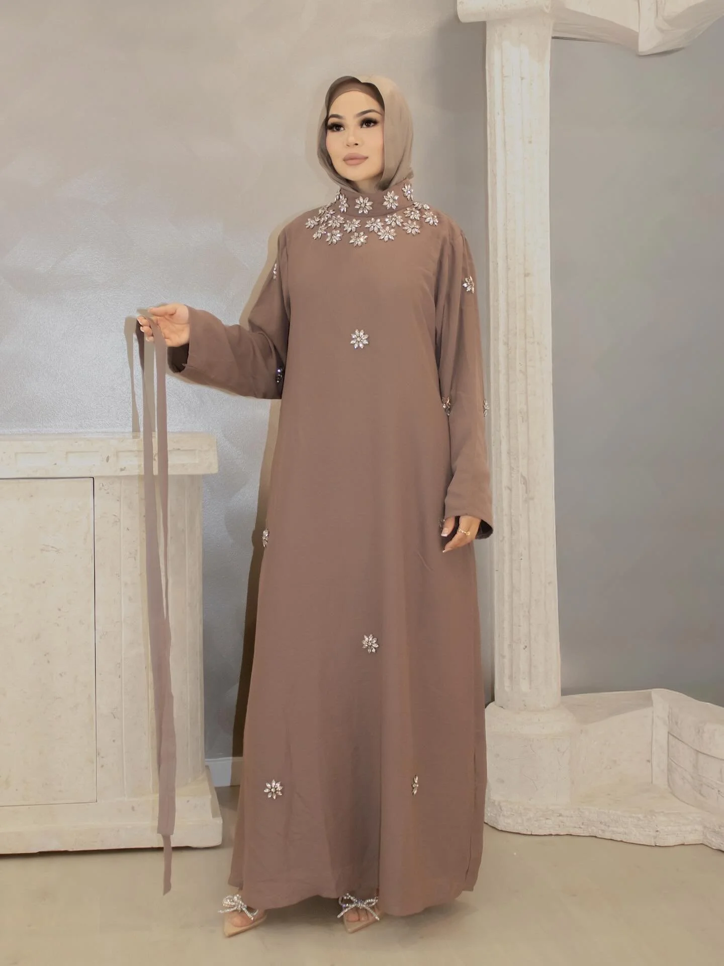 ✨ The Alia Kaftan ✨
A true statement piece for the season &mdash; crafted from soft, lightweight chiffon and finished with a beautifully detailed crystal neckline. The Alia Kaftan is designed for elegance and ease, draping effortlessly while adding j