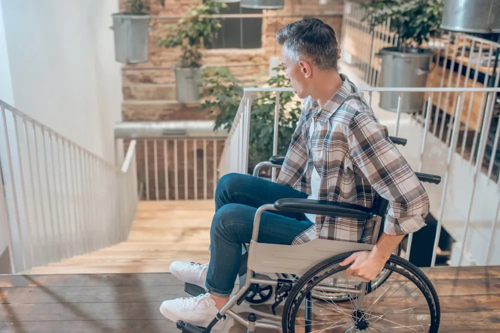 Occupational therapist assessing home environment for safety and accessibility modifications