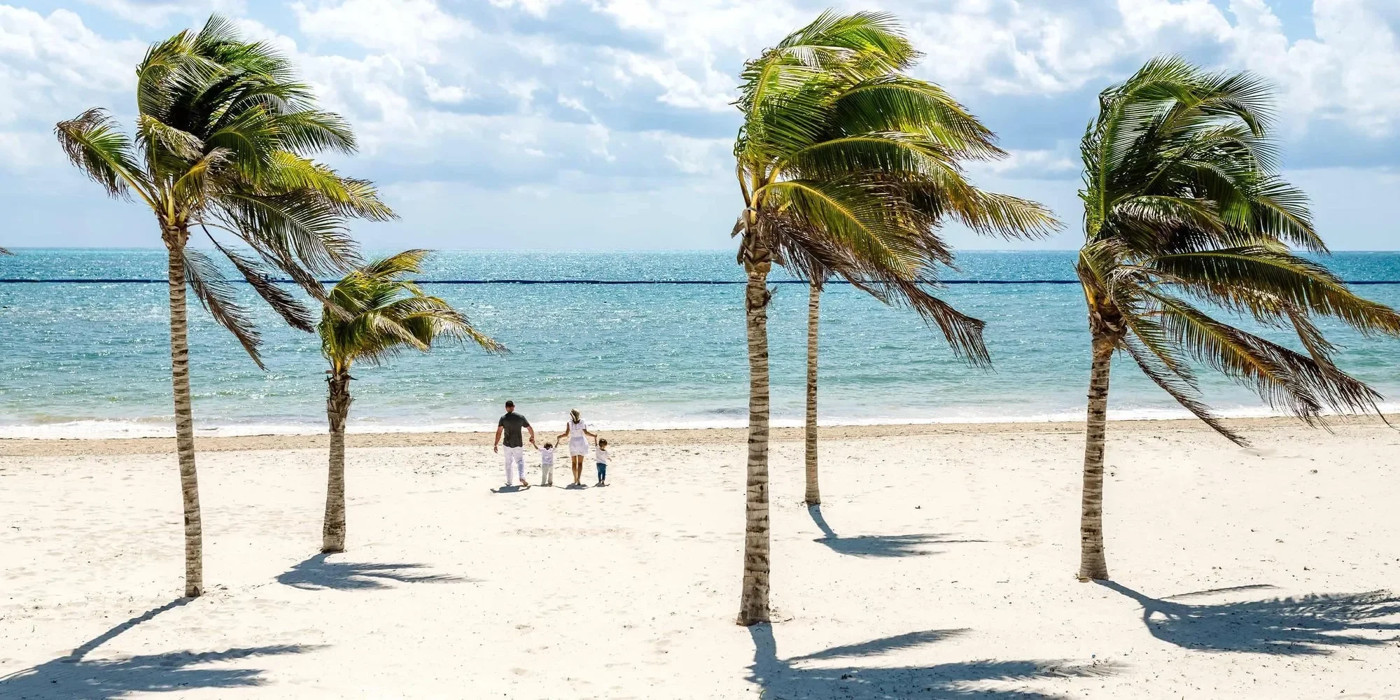 family_at_the_beach_moon_palace_the_grand_e03262a52c_b13fec3770.webp