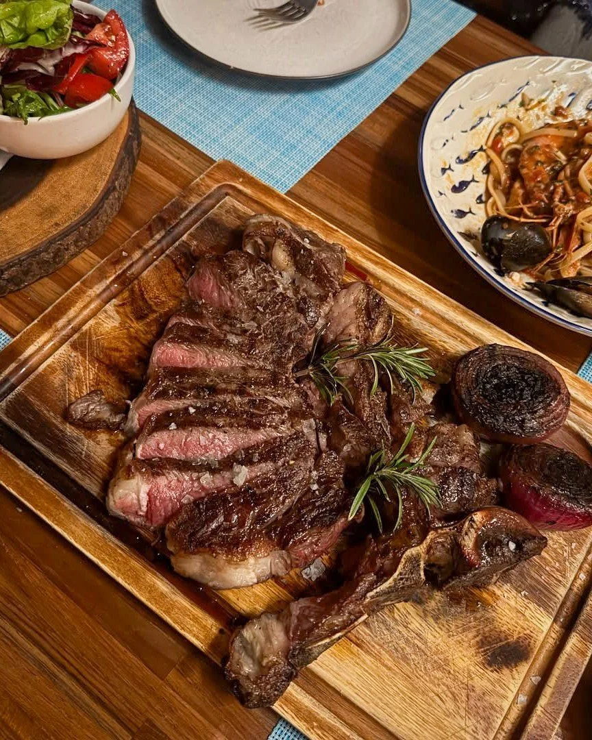 Current weather in Samui: unpredictable.
Dinner at 2 Fishes: always excellent.

Rain or shine, our kitchen team are fired up, the wine is flowing and the tables are warm and cosy inside. Join us for fresh seafood, homemade pasta and a beautiful eveni