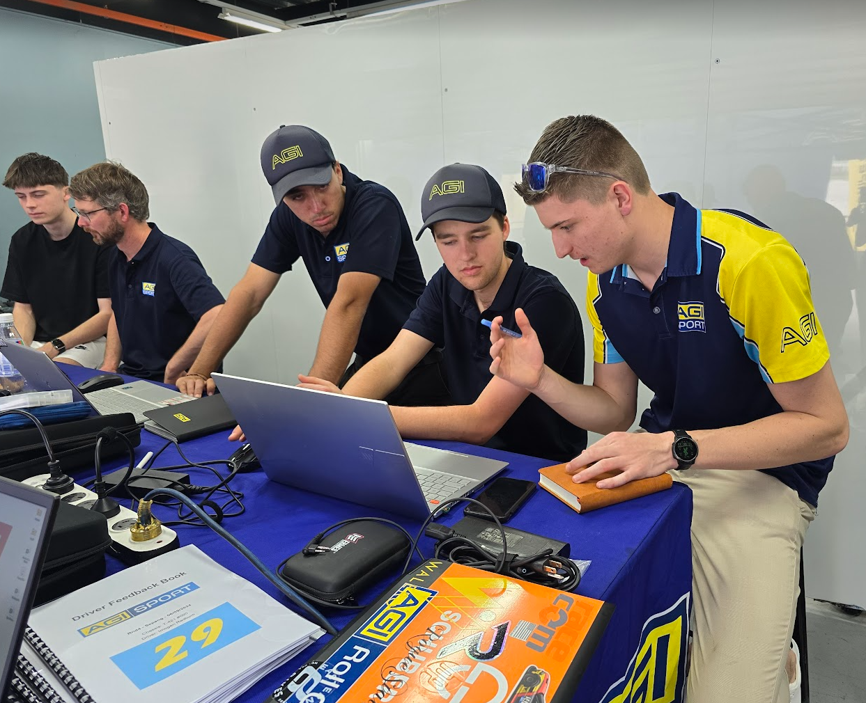 Seth Gilmore working with engineers and debriefing