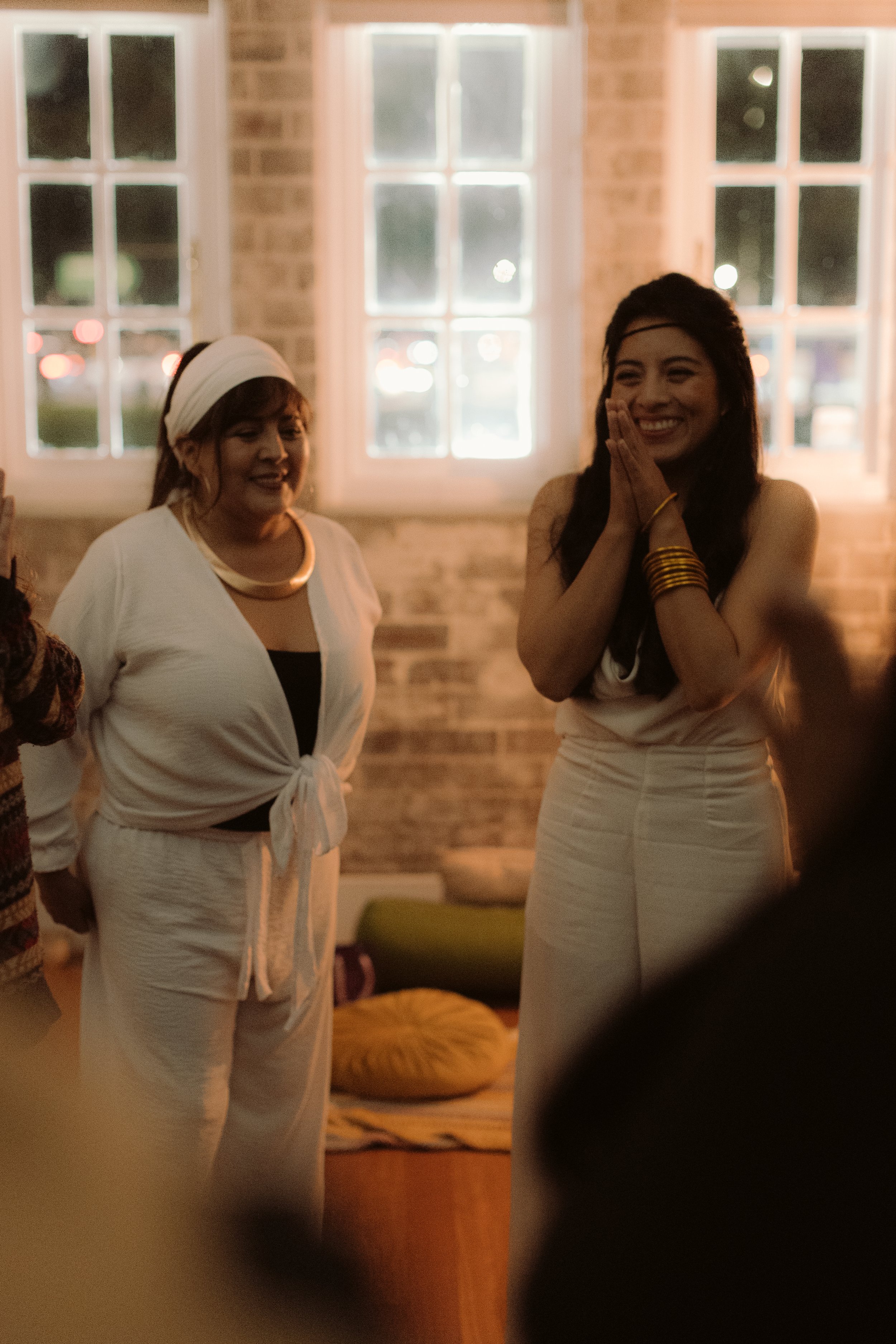 Nina Segura guiding a ceremonial cacao initiation with joy and presence