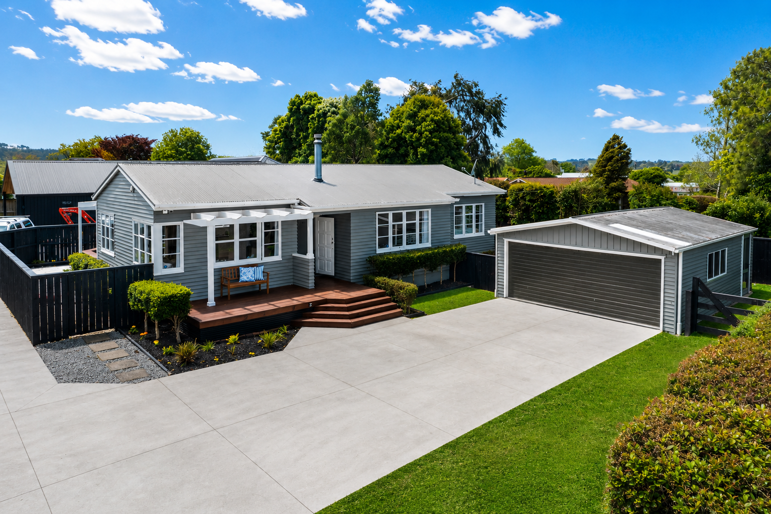 Riverhead driveway and renovation project by Parris Builds, featuring a new concrete driveway, landscaped entrance and enhanced street appeal.