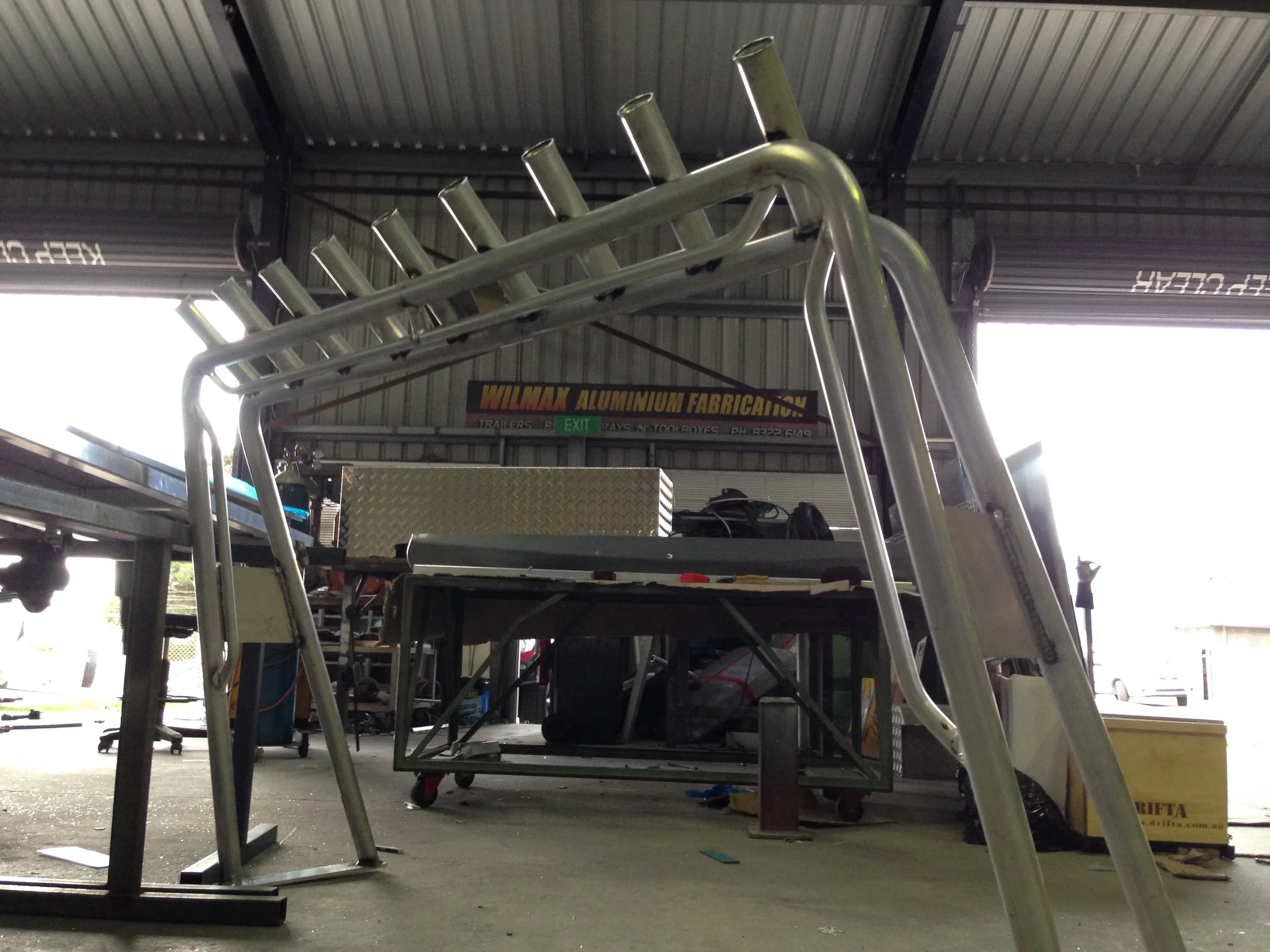 A boat rack that holds fishing rod holders made from aluminium