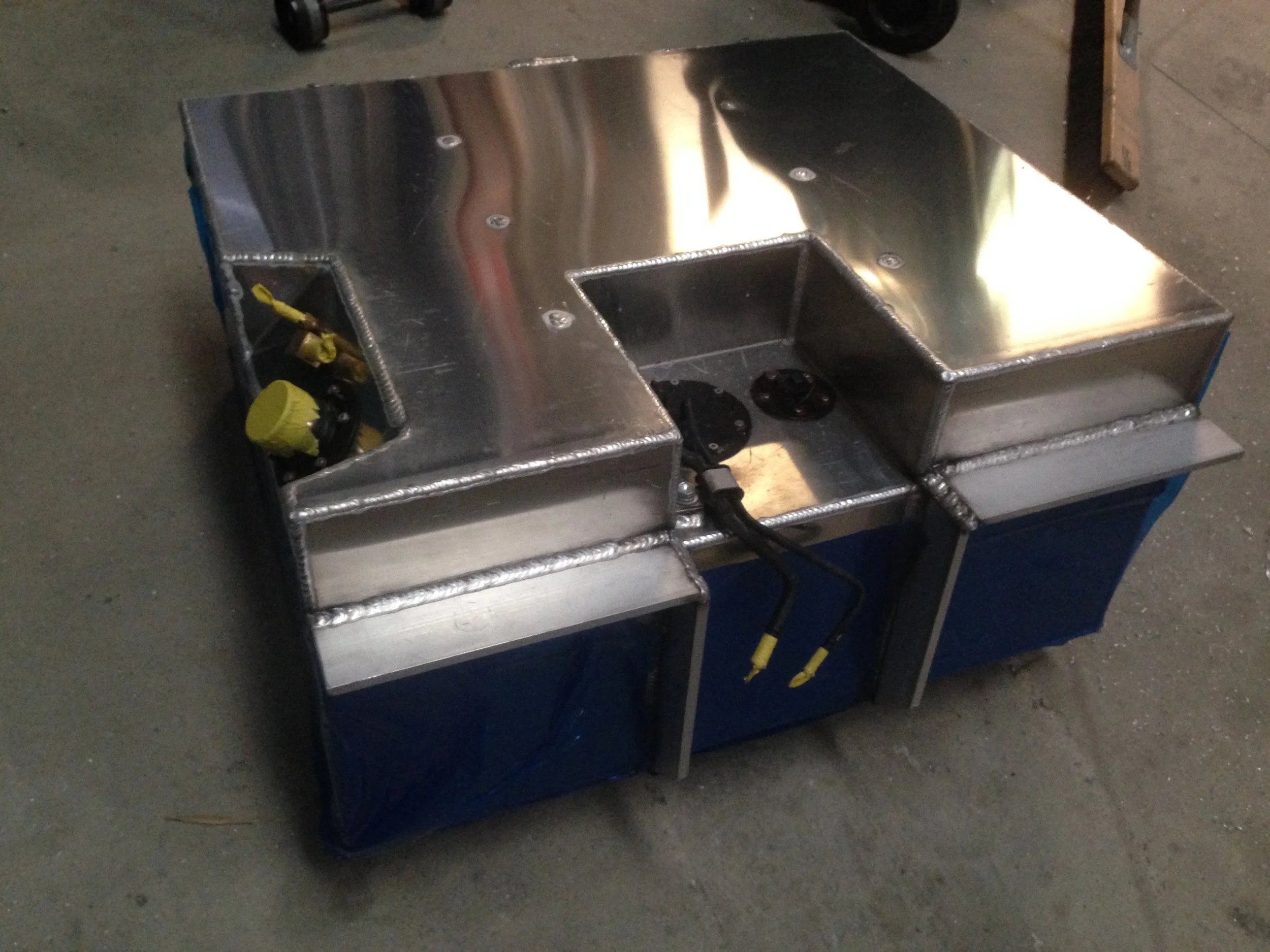 A custom aluminium fuel tank for a landcruiser.